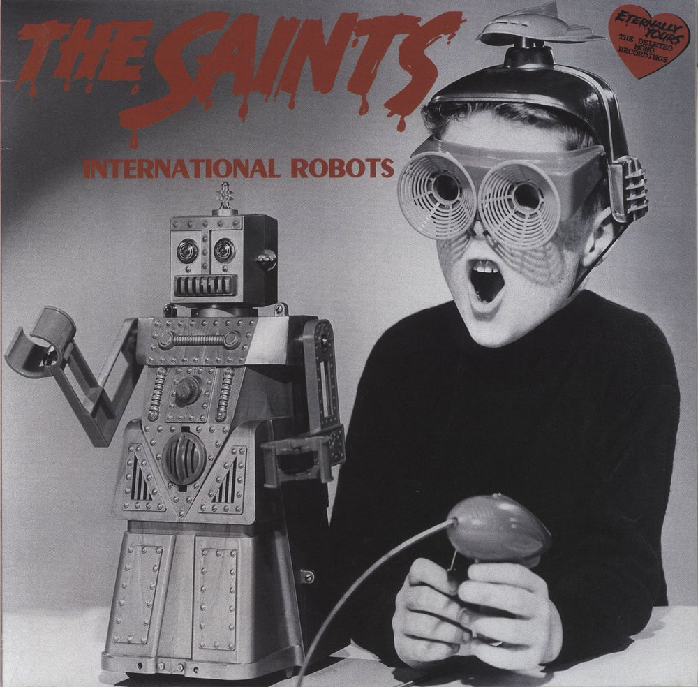 The Saints International Robots - Orange Translucent Vinyl UK 12" vinyl single (12 inch record / Maxi-single) U03