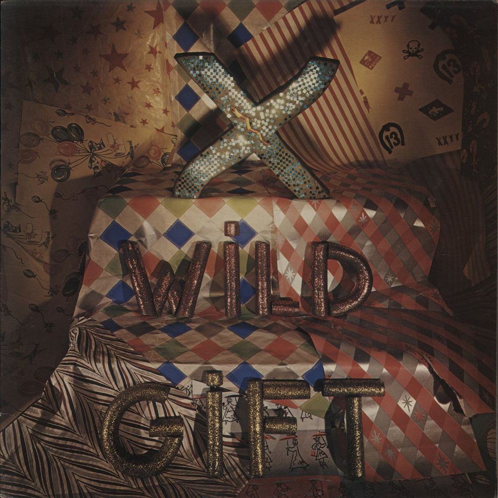 X Wild Gift UK vinyl LP album (LP record) SR-107