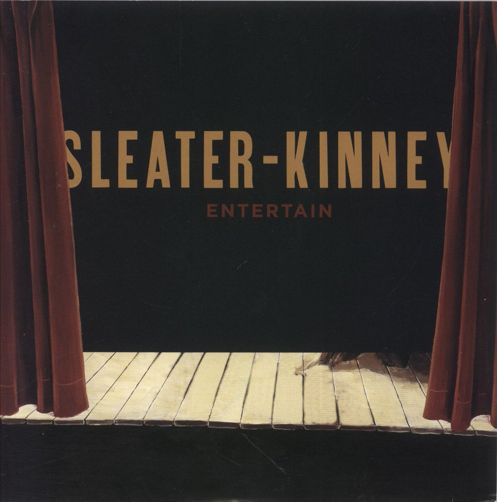 Sleater-Kinney Entertain - Red Vinyl US 7" vinyl single (7 inch record / 45) SP687