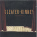 Sleater-Kinney Entertain - Red Vinyl US 7" vinyl single (7 inch record / 45) SP687