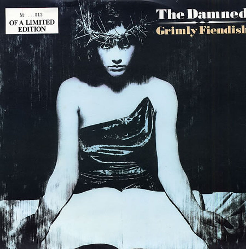 The Damned Grimly Fiendish - White Vinyl UK 12" vinyl single (12 inch record / Maxi-single) GRIMX1