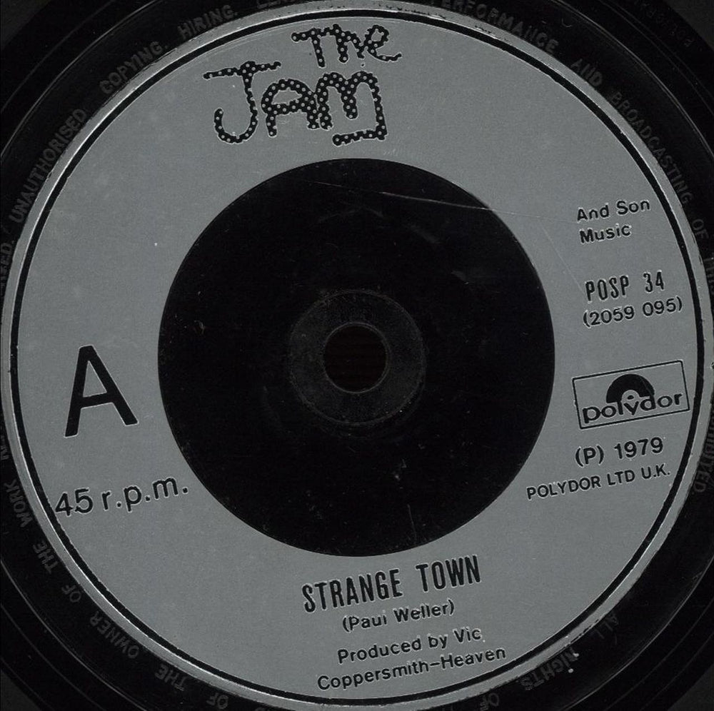 The Jam Strange Town - Inj UK 7" vinyl single (7 inch record / 45) POSP34